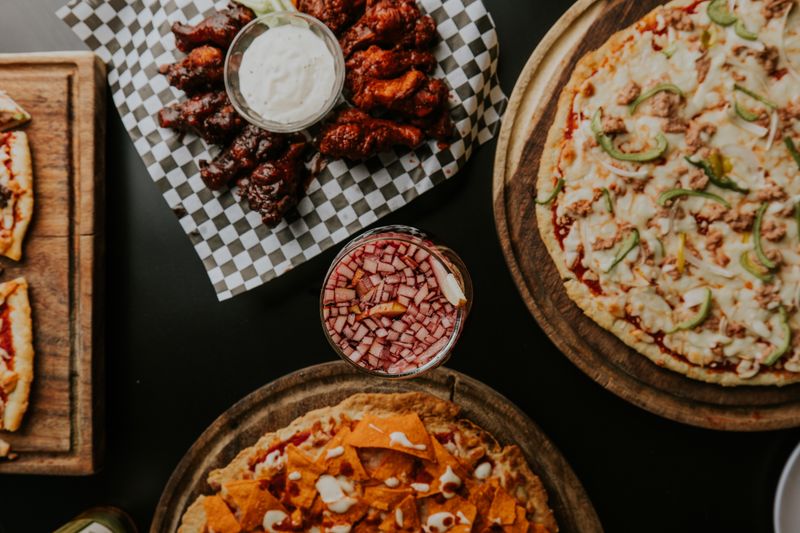 Buffalo chicken pizza with blue cheese and hot sauce