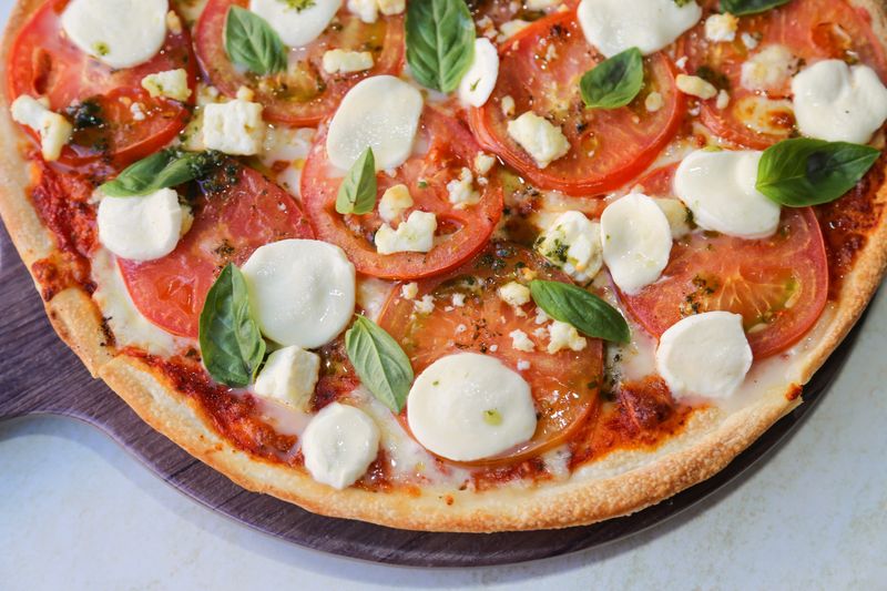 Margherita pizza with fresh tomato and mozzarella
