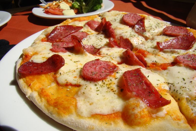 Pepperoni pizza with extra cheese and crispy toppings